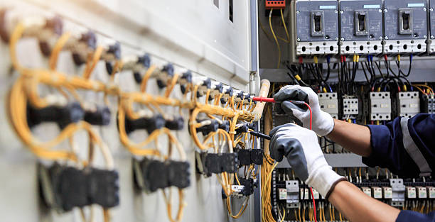 Professional Electrician technician working in Washington Park, FL